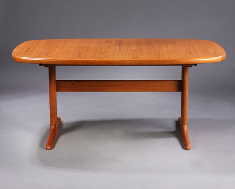 Teak dining table with extension by Forest City.