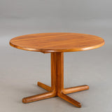 Round Solid teak dining table. Mid-century design.