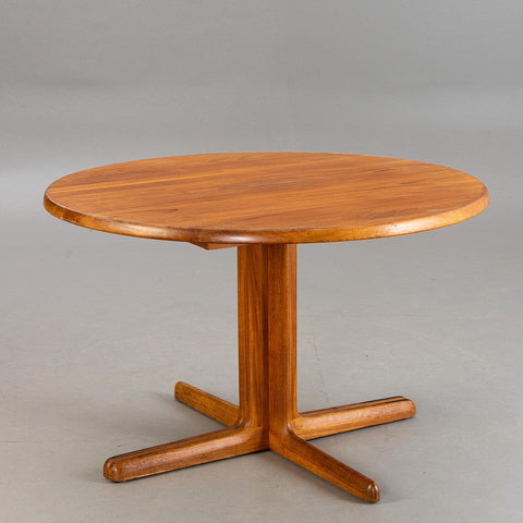 Round Solid teak dining table. Mid-century design.