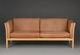 Beach Loveseat with Light Brown Leather Cushions