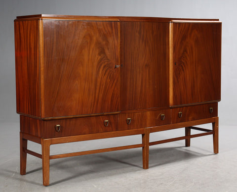 Bruno P. Andersen. High sideboard, walnut, brass.
