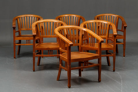 Massive Solid Teak armchairs