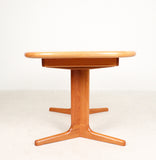 2392012. Glostrup, extendable solid teak dining table, with 2 leaves, Denmark, 1970s.