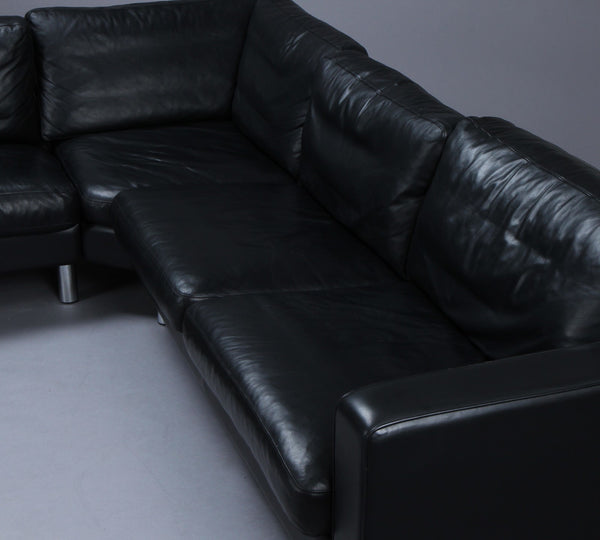 Black leather Freestanding corner sofa , Stouby.