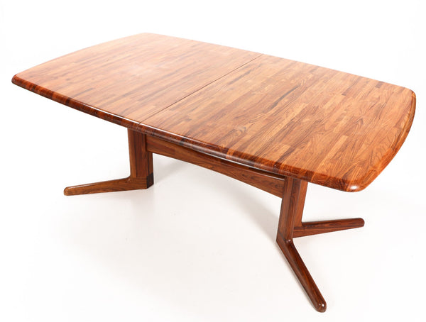 Solid rosewood Dining table/conference table with four additional plates. Korup chair factory.