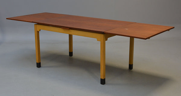 Teak and beech Dining table with 2 extension. By Bjerringbro Sawmill.