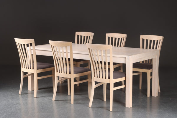 Rectangular dining table with extra leaves and six chairs, white pigmented oak