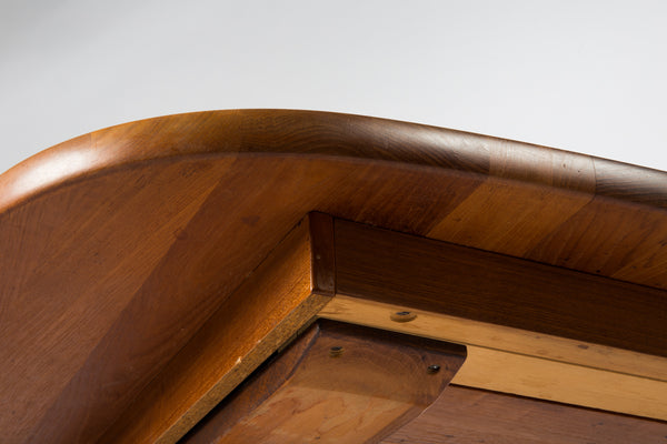 Solid teak dining table with 1 leaf.