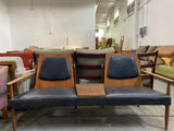 Made in North America wood and leather love seat