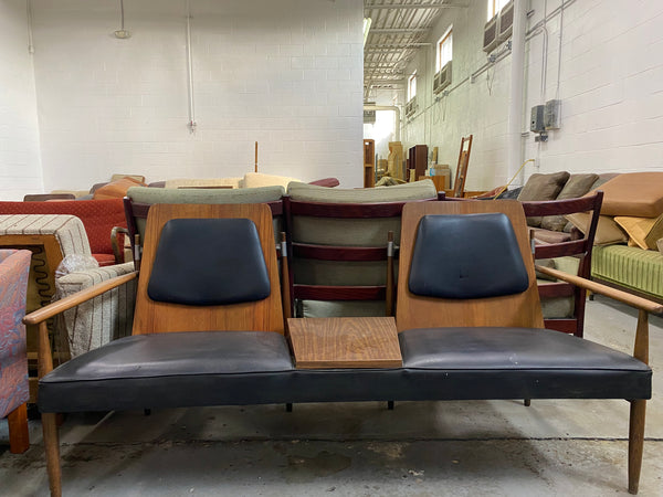 Made in North America wood and leather love seat