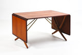 H.J. Wegner. 'Sable table'. Dining table, model AT-304, teak/oak