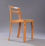 Beech wood  Dining table and 4 chairs. by Well done. Denmark