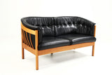 Two-person cherry sofa, black leather- Nielaus.