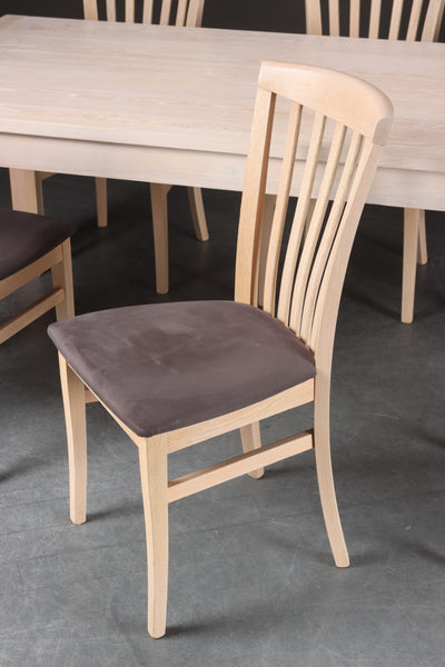 Rectangular dining table with extra leaves and six chairs, white pigmented oak