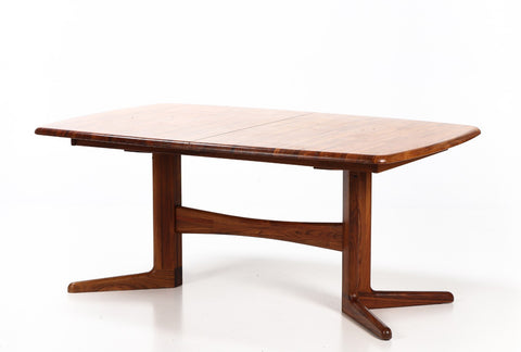 Solid rosewood Dining table/conference table with four additional plates. Korup chair factory.