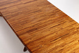 Solid rosewood Dining table/conference table with four additional plates. Korup chair factory.