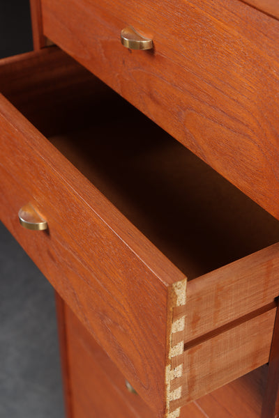 Teak narrow chest of drawers, 8 drawers.