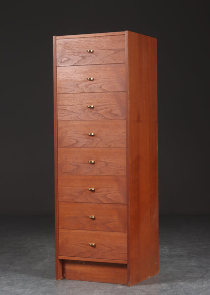 Teak narrow chest of drawers, 8 drawers.