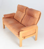 SOLID OAK Sofa, cognac colored leather Skipper's Furniture.