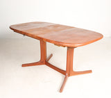 Glostrup, extendable table/dining table,Solid teak, Denmark, 1970s.
