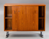 Teak sideboard on a chromed base.