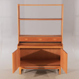 Teak cabinet with bookshelf  and drawers, with a pull out desk shelf. Ajfa, by Tibro. Sweden.
