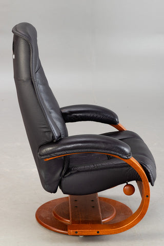 Relax / Stressless leather armchair with footstool.