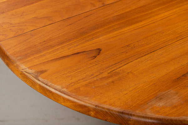 Round Solid teak dining table. Mid-century design.