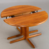 Round Solid teak dining table. Mid-century design.