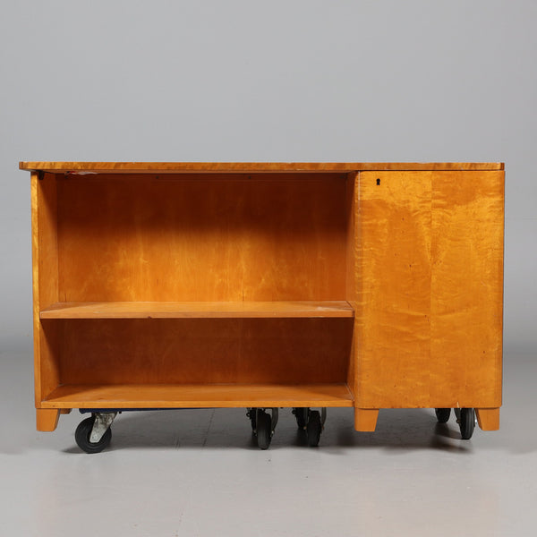 SOLID FLAMING BIRCH DESK, second half of the 20th century.