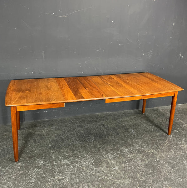 SOLID TEAK EXTENDABLE DINING TABLE