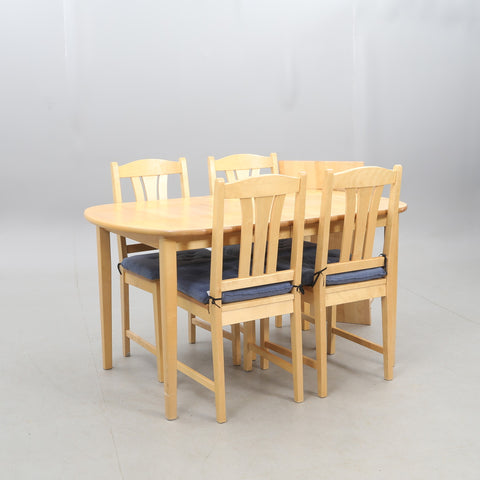 table with one extension and six chairs