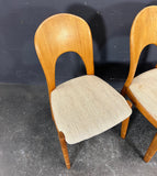 4  SOLID TEAK SCULPTURED CHAIRS. NIELS KOEFOED.