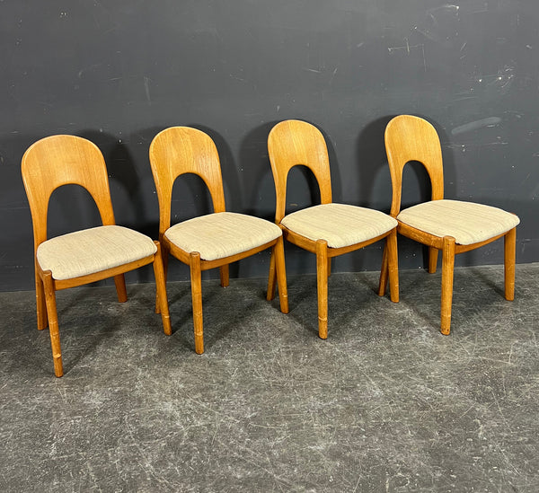 4  SOLID TEAK SCULPTURED CHAIRS. NIELS KOEFOED.