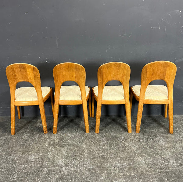 4  SOLID TEAK SCULPTURED CHAIRS. NIELS KOEFOED.