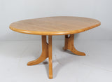 White oak extendable dining table, 1980s. By RAINER DAUMILLER