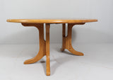 White oak extendable dining table, 1980s. By RAINER DAUMILLER