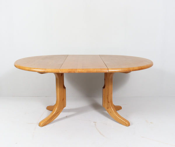 White oak extendable dining table, 1980s. By RAINER DAUMILLER