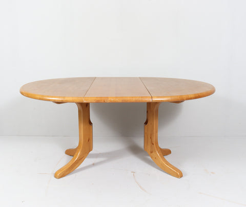 White oak extendable dining table, 1980s. By RAINER DAUMILLER