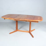 SOLID TEAK Expandable table/dining table, Denmark, 1960s. DYRLUND.