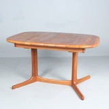 SOLID TEAK Expandable table/dining table, Denmark, 1960s. DYRLUND.