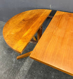 SOLID ROUND TEAK TABLE WITH ONE INSERT