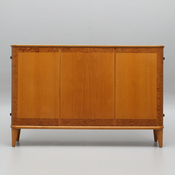 A Swedish Modern sideboard TEAK AND MAHOGANY COMBINATION , 1940s/50s.