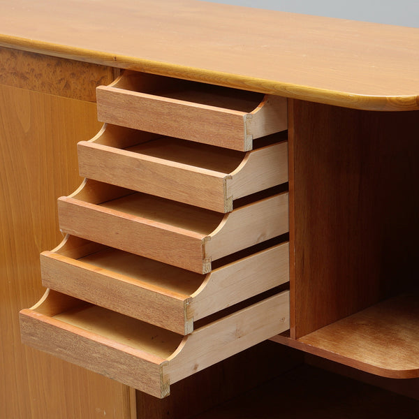 A Swedish Modern sideboard TEAK AND MAHOGANY COMBINATION , 1940s/50s.
