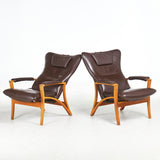 HJORT KNUDSEN. A pair of leather armchairs