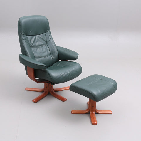 SPINNING ARMCHAIR WITH FOOTSTOOL, green leatherette, 1900/2000s.