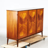 CABINET, circa 1940s, veneered with mahogany, background interior with file drawers and shelves.