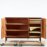 CABINET, circa 1940s, veneered with mahogany, background interior with file drawers and shelves.