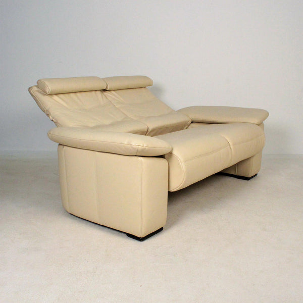 Recliner Love seat sofa in cream colored leather. Made in Denmark