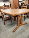 Teak dining table